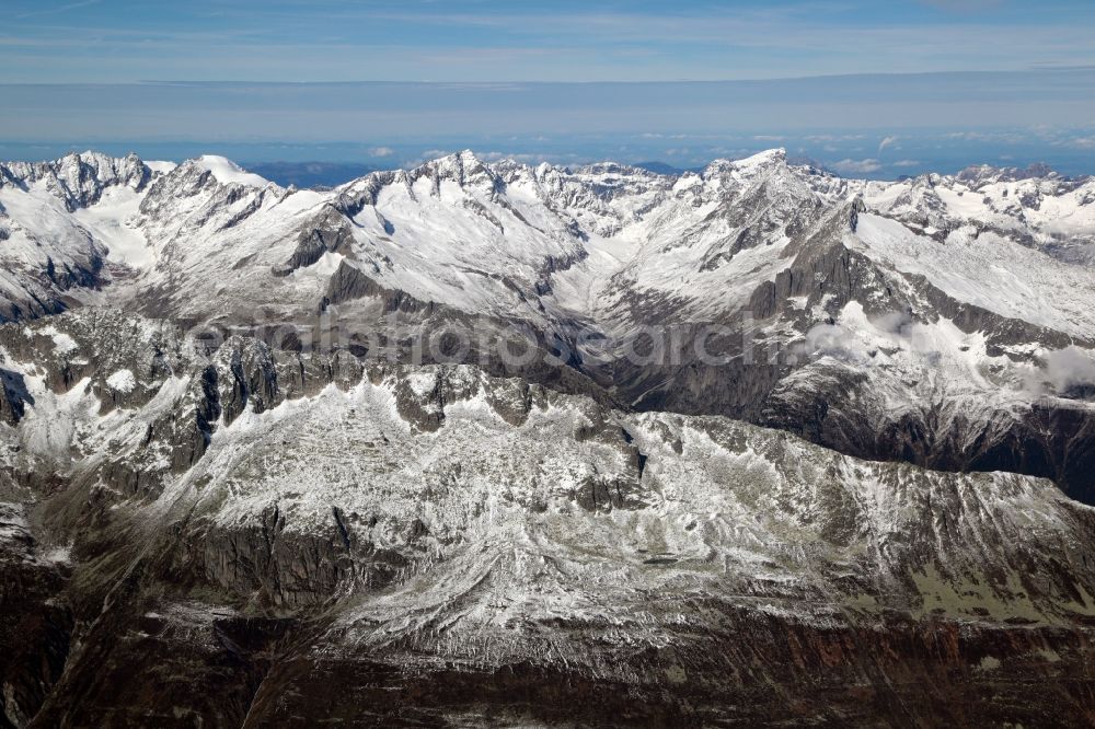 Andermatt from above - Wintry snowy Rocky and mountainous landscape of the Urner Alps at Andermatt in the canton Uri, Switzerland