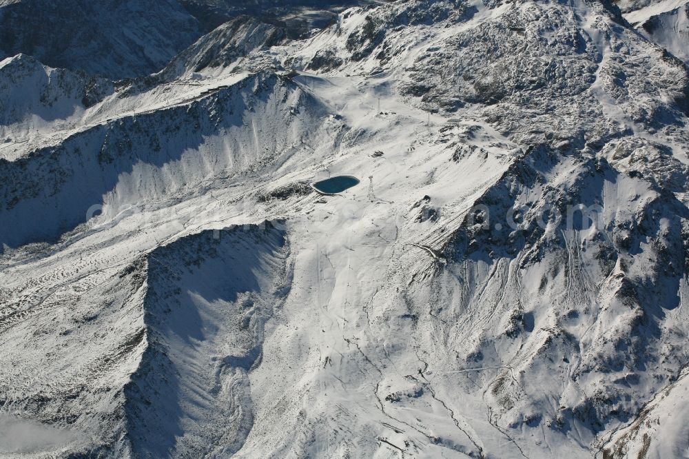 Davos from the bird's eye view: Wintry snowy summit region of Weissfluhjoch in the winter sports area of Davos in the canton Graubuenden, Switzerland