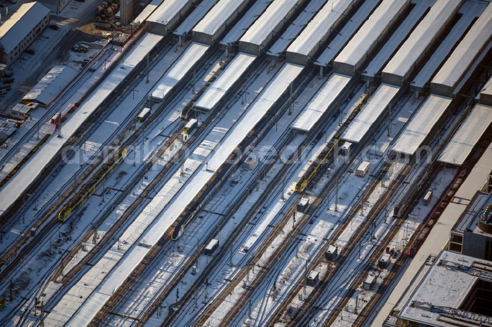 Aerial image Stuttgart - Wintry snowy track progress and building of the main station of the railway in the district Stadtzentrum in Stuttgart in the state Baden-Wuerttemberg, Germany