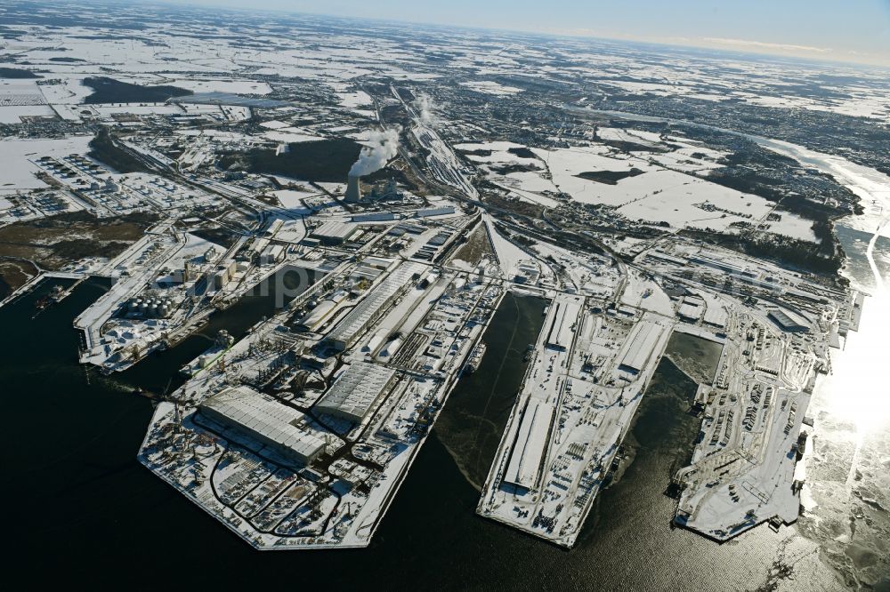 Aerial image Rostock - Wintry snowy port facilities on the shores of the harbor of of Seehafen of ROSTOCK PORT GmbH in the district Peez in Rostock at the baltic sea coast in the state Mecklenburg - Western Pomerania, Germany