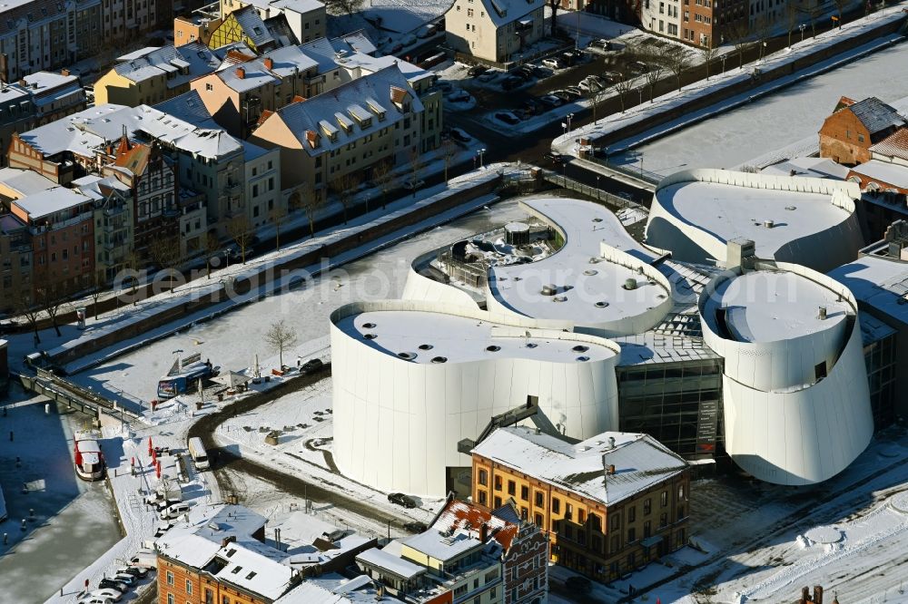 Stralsund from above - Wintry snowy harbor island by Ozeaneum Oceanographic Museum in Stralsund in Mecklenburg - Western Pomerania