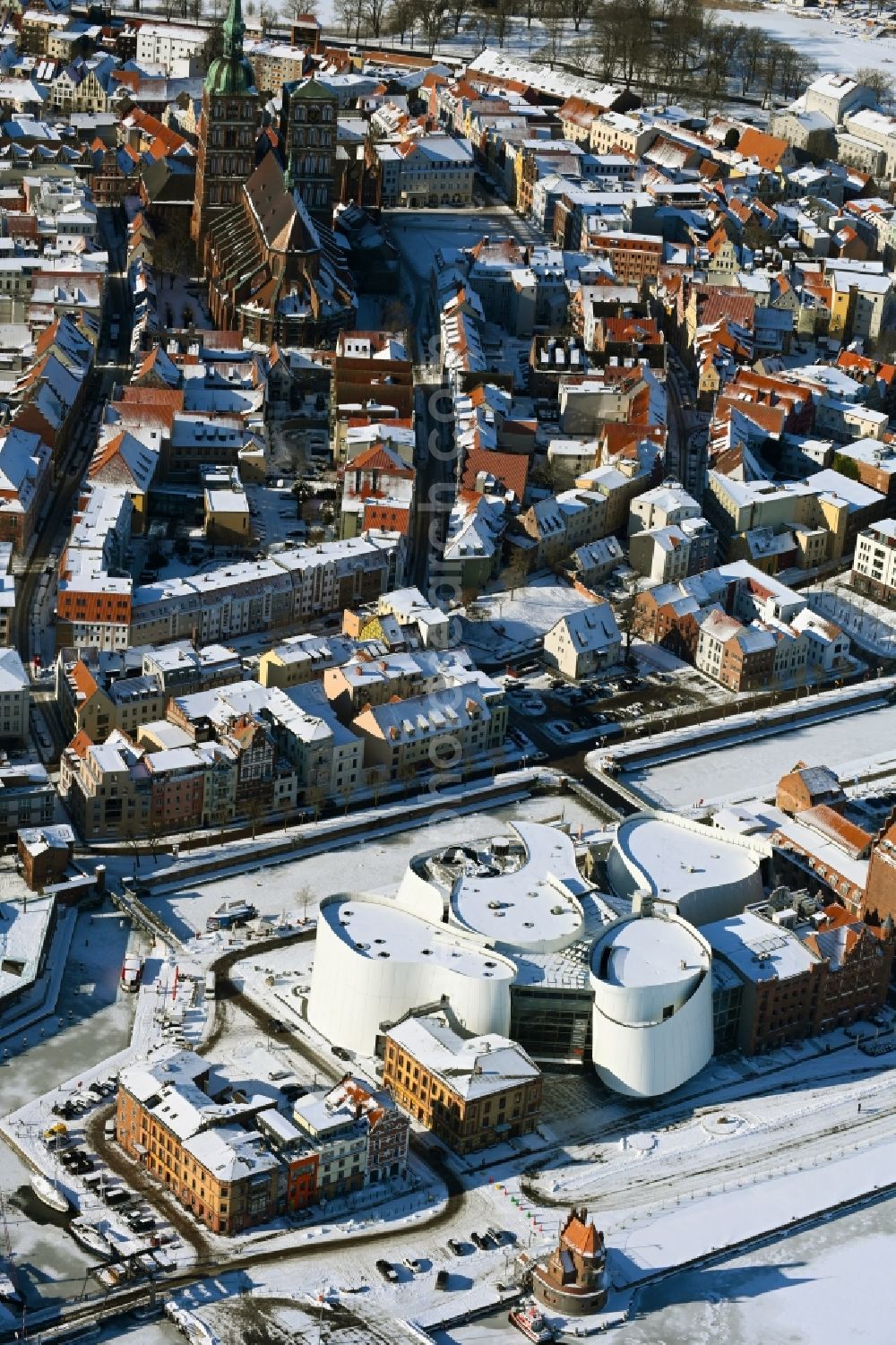 Aerial image Stralsund - Wintry snowy harbor island by Ozeaneum Oceanographic Museum in Stralsund in Mecklenburg - Western Pomerania