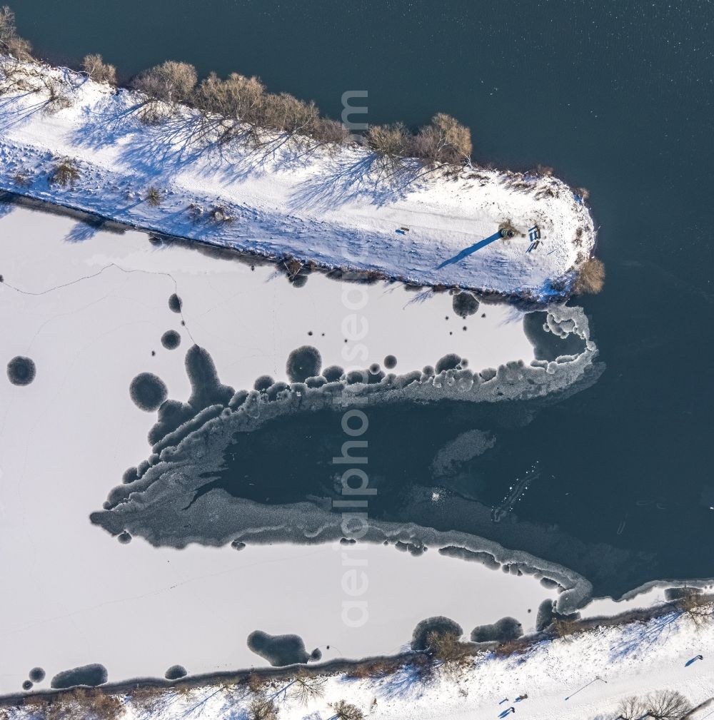 Aerial image Witten - Wintry snowy peninsula with land access and shore area on the Kemnader See in Witten in the state North Rhine-Westphalia, Germany
