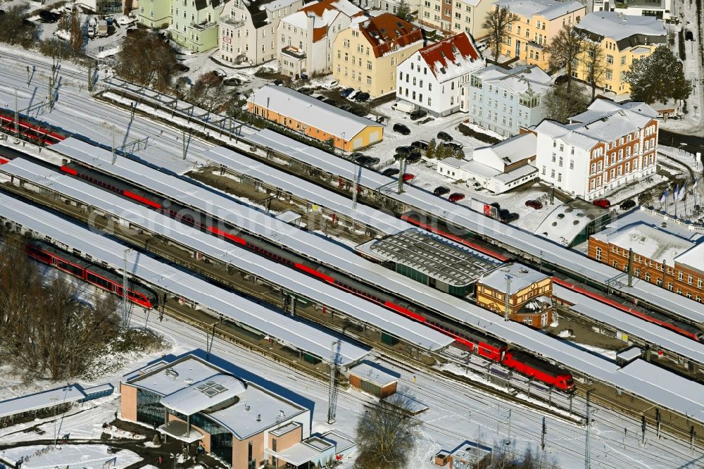 Rostock from above - Wintry snowy track progress and building of the main station of the railway in Rostock in the state , Germany