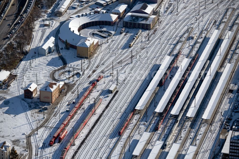 Aerial image Würzburg - Wintry snowy track progress and building of the main station of the railway in Wuerzburg in the state Bavaria, Germany