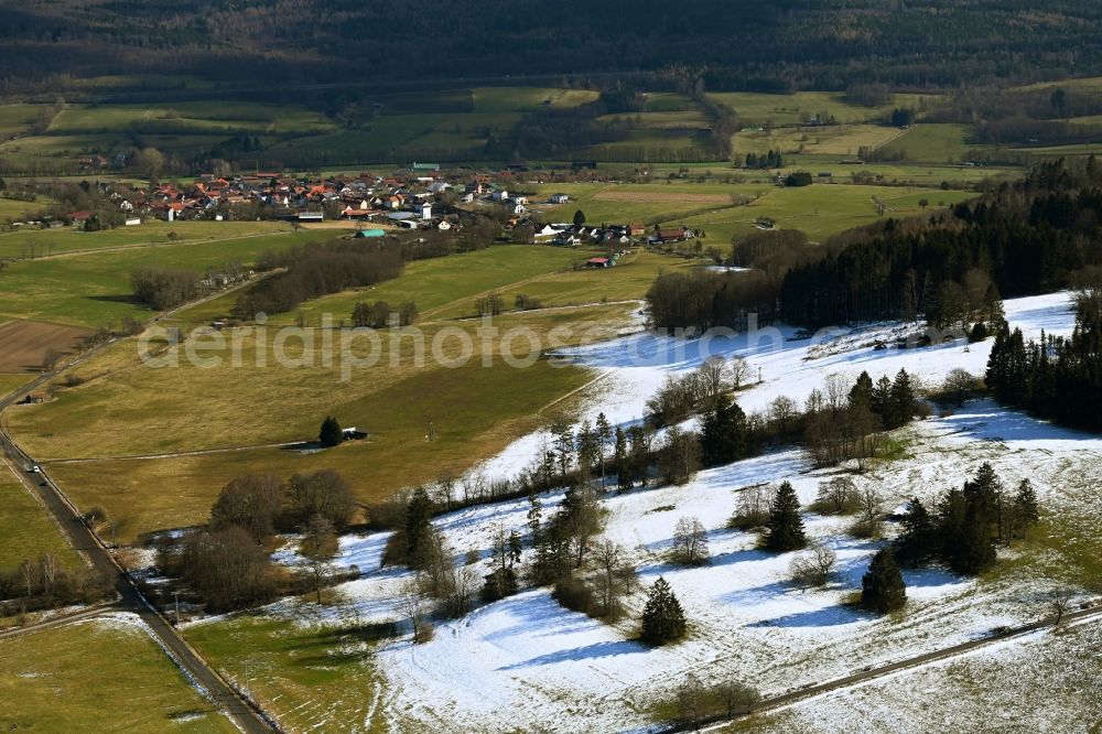 Aerial photograph Kalbach - Wintry snowy wavy grass surface structures of a hilly landscape on Frauenstein in the district Heubach in Kalbach in the state Hesse, Germany