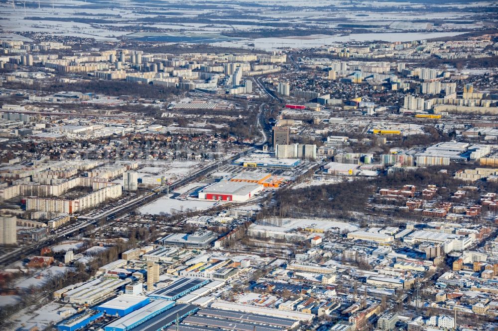 Aerial photograph Berlin - Wintry snowy industrial and commercial area along the Landsberger Allee - Herzbergstrasse in the district Lichtenberg in Berlin, Germany