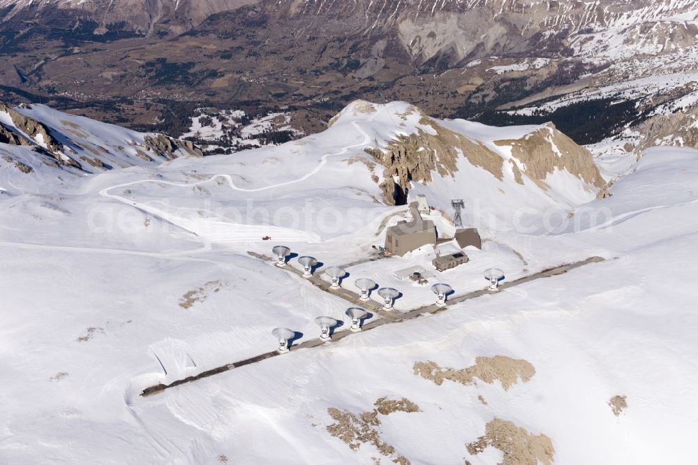 Le Devoluy from the bird's eye view: Wintry snowy interferometer on the mountain pic de bure in Le Devoluy in Provence-Alpes-Cote d'Azur, France. It is specifically designed for millimetre-wave observations