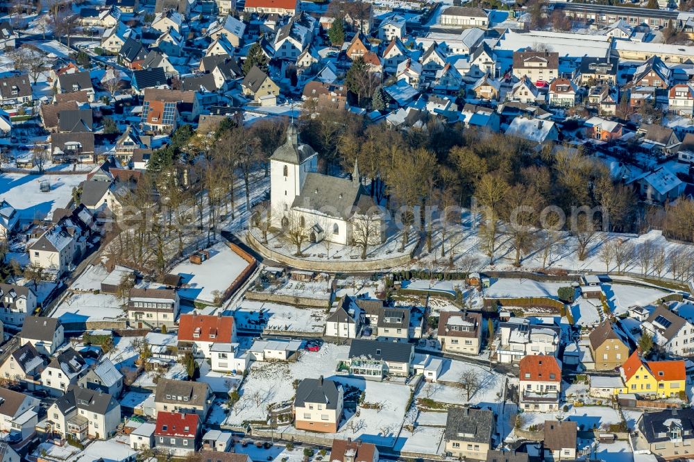 Warstein from above - Wintry snowy Church building in Warstein in the state North Rhine-Westphalia