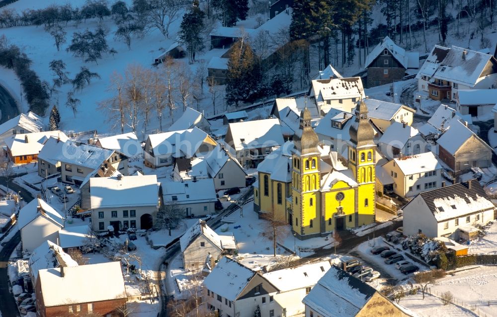 Aerial image Marsberg - Wintry snowy church building of the cathedral of Dom Maria-Magdalena in the district Padberg in Marsberg in the state North Rhine-Westphalia