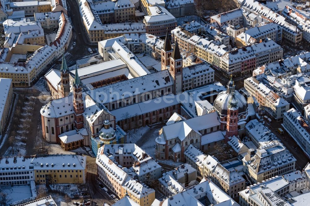 Würzburg from the bird's eye view: Wintry snowy church building of the cathedral Wuerzburger Dom in the old town in Wuerzburg in the state Bavaria, Germany