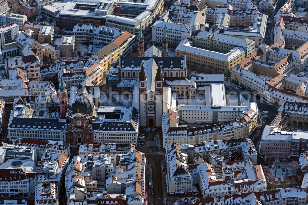 Würzburg from the bird's eye view: Wintry snowy church building of the cathedral Wuerzburger Dom in the old town in Wuerzburg in the state Bavaria, Germany