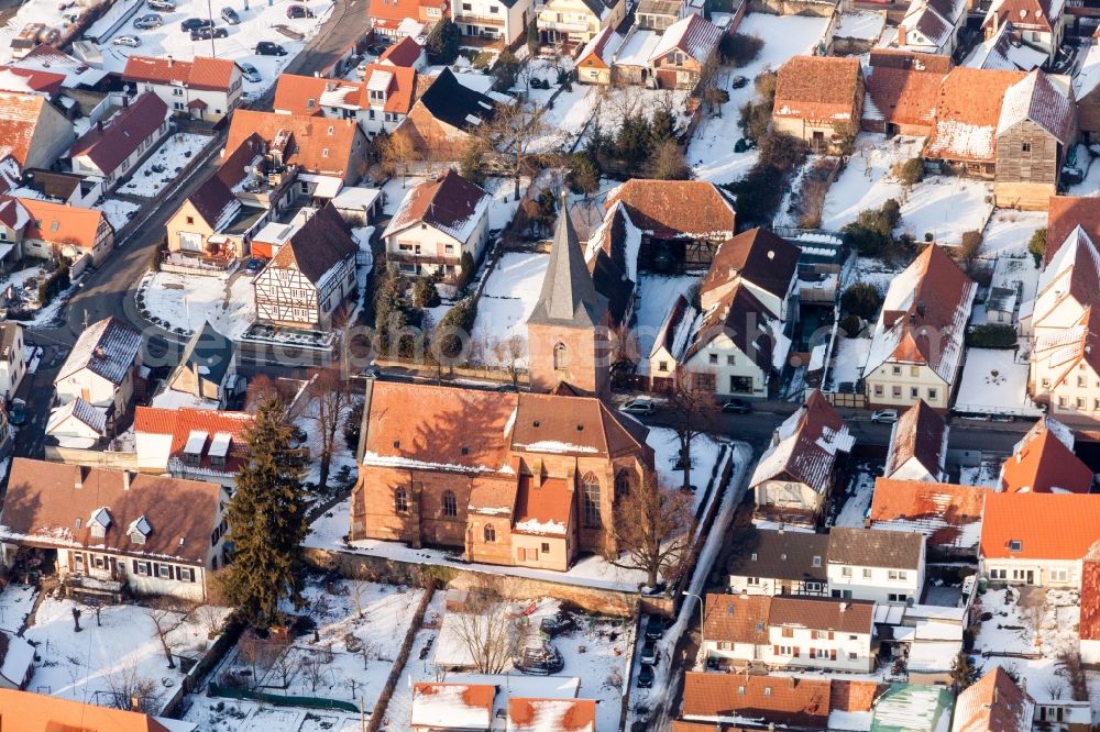 Rohrbach from the bird's eye view: Wintry snowy Church building in the village of in Rohrbach in the state Rhineland-Palatinate, Germany