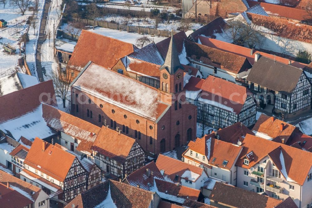 Steinweiler from above - Wintry snowy Evangelic Church building in the village of in Steinweiler in the state Rhineland-Palatinate, Germany