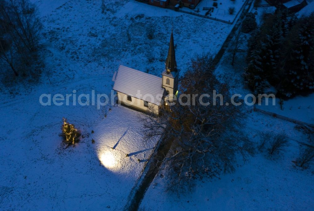 Elend from above - Wintry snowy churches building the chapel Holzkirche Elend on Bodeweg in Elend in the state Saxony-Anhalt, Germany