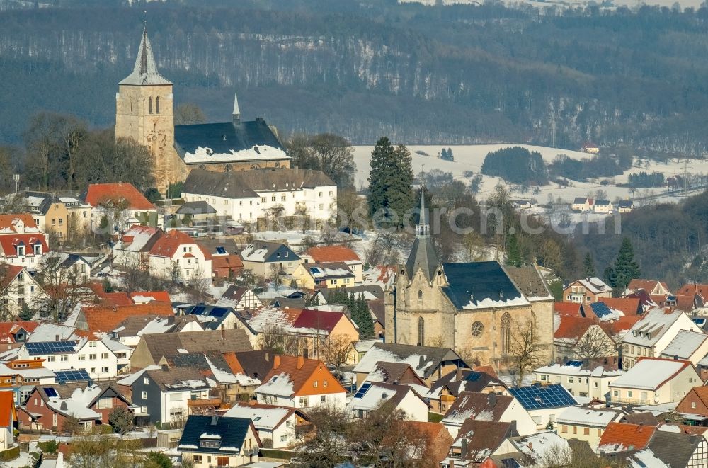 Marsberg from above - Wintry snowy church building Kath. Probsteipfarramt Niedermarsberg Casparistrasse in Marsberg in the state North Rhine-Westphalia