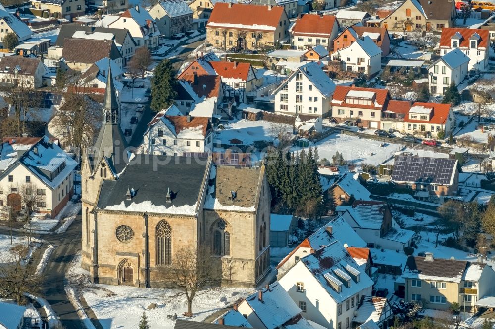 Aerial image Marsberg - Wintry snowy church building Kath. Probsteipfarramt Niedermarsberg Casparistrasse in Marsberg in the state North Rhine-Westphalia