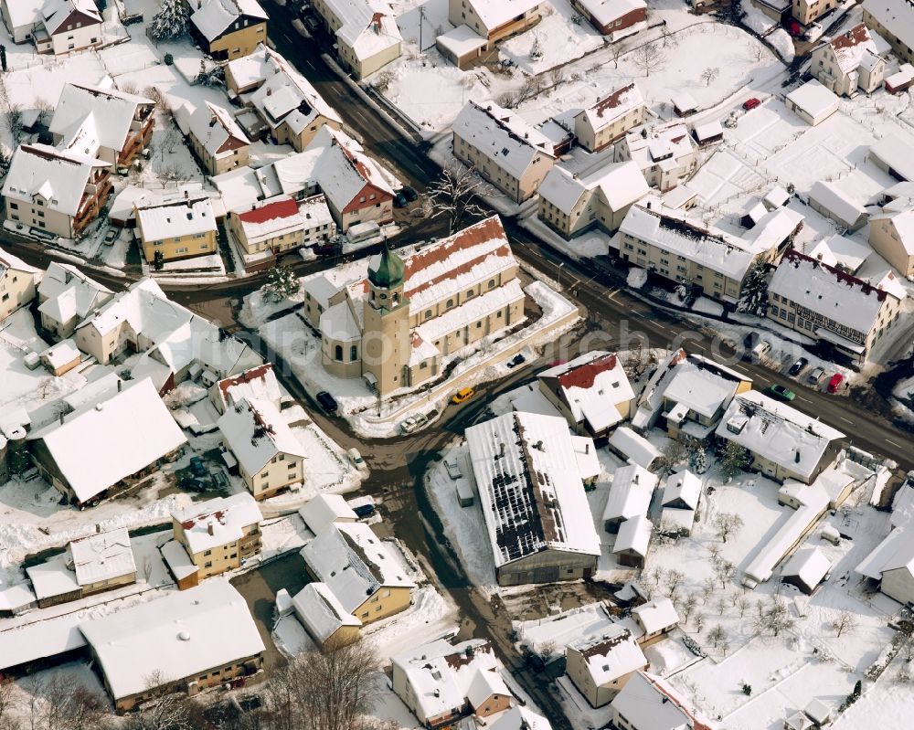 Aerial image Lauterstein - Wintry snowy church building St. Martin in Lauterstein in the state Baden-Wuerttemberg, Germany