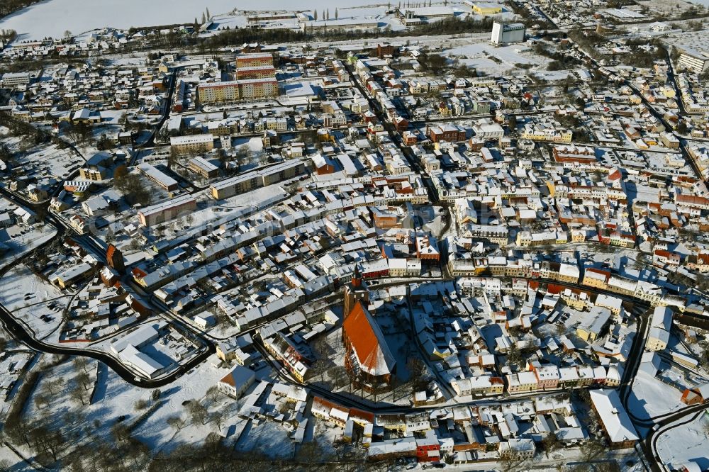 Aerial image Altentreptow - Wintry snowy church building in St.-Petri-Kirche Old Town- center of downtown in Altentreptow in the state Mecklenburg - Western Pomerania, Germany