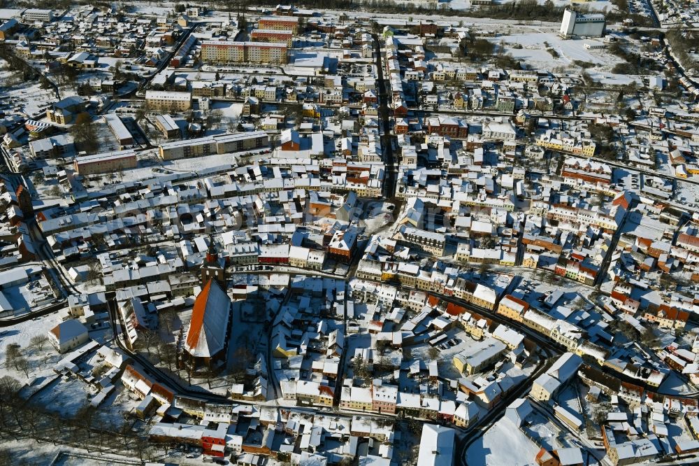 Altentreptow from above - Wintry snowy church building in St.-Petri-Kirche Old Town- center of downtown in Altentreptow in the state Mecklenburg - Western Pomerania, Germany