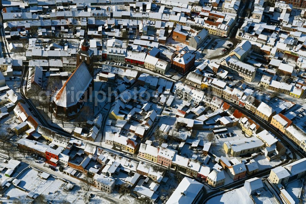 Aerial image Altentreptow - Wintry snowy church building in St.-Petri-Kirche Old Town- center of downtown in Altentreptow in the state Mecklenburg - Western Pomerania, Germany