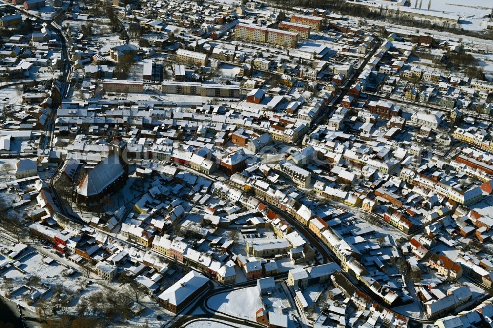 Altentreptow from above - Wintry snowy church building in St.-Petri-Kirche Old Town- center of downtown in Altentreptow in the state Mecklenburg - Western Pomerania, Germany