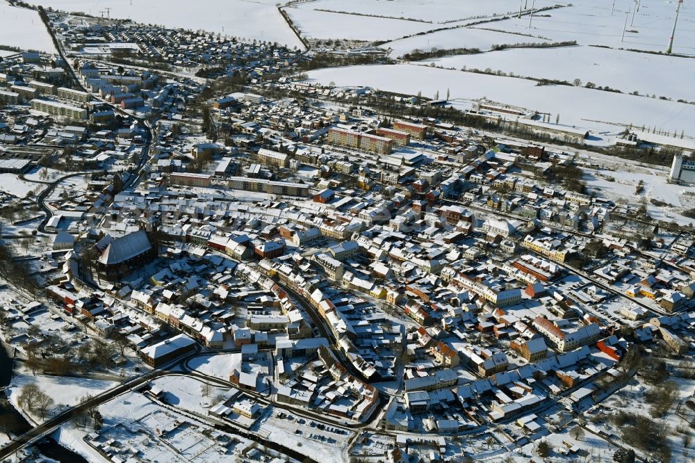 Aerial image Altentreptow - Wintry snowy church building in St.-Petri-Kirche Old Town- center of downtown in Altentreptow in the state Mecklenburg - Western Pomerania, Germany