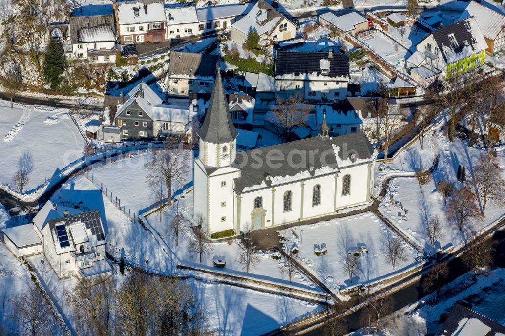 Aerial photograph Scharfenberg - Wintry snowy church building in Scharfenberg in the state North Rhine-Westphalia