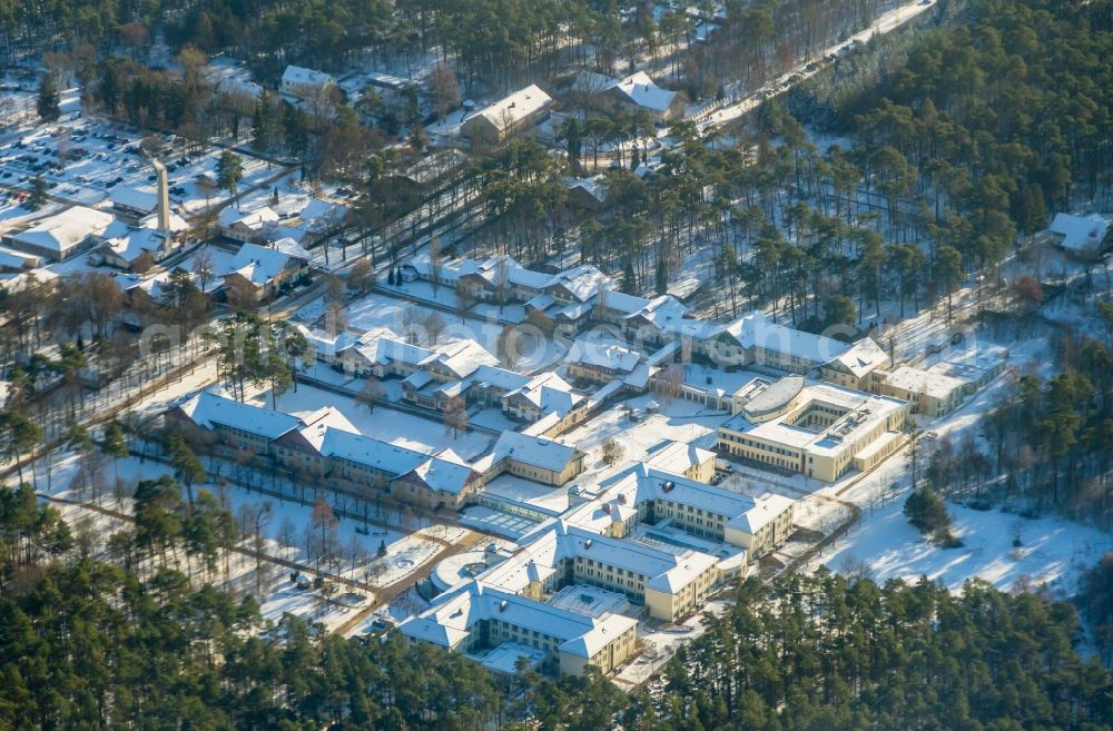 Sommerfeld from the bird's eye view: Wintry snowy hospital grounds of the Clinic Sana Kliniken Sommerfeld in Sommerfeld in the state Brandenburg, Germany