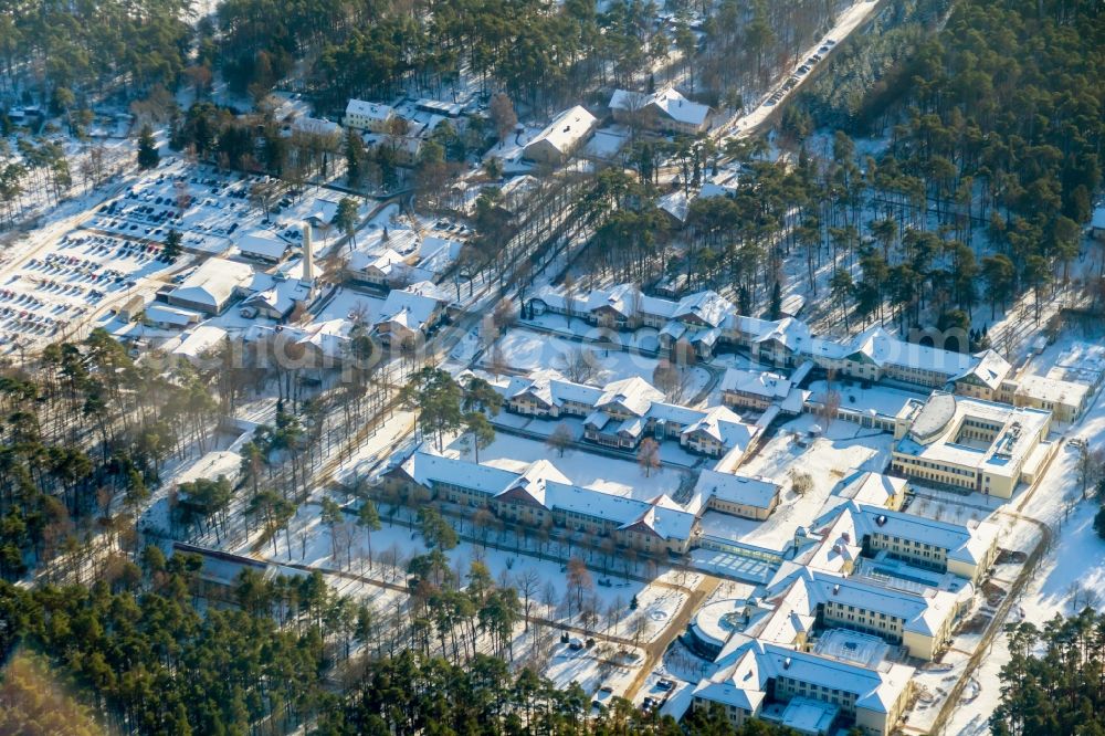 Aerial image Sommerfeld - Wintry snowy hospital grounds of the Clinic Sana Kliniken Sommerfeld in Sommerfeld in the state Brandenburg, Germany