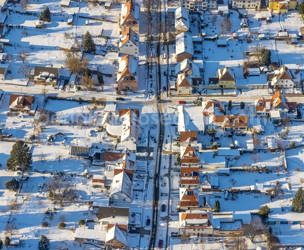 Aerial image Soest - Wintry snowy road over the crossroads Blumenstrasse - Medebacher Strasse - Muellingser Weg in Soest in the state North Rhine-Westphalia, Germany