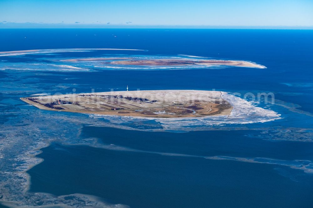 Aerial image Insel Neuwerk - Wintry snowy coastal area of North Sea - Island in Insel Neuwerk in the state Lower Saxony, Germany