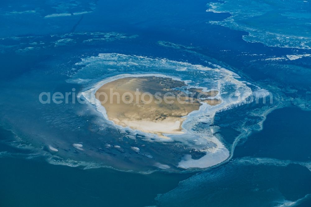 Nigehörn from above - Wintry snowy coastal area of a??a??the North Sea island in Scharhoern Nigehoern outer reef sand banks in the state of Hamburg