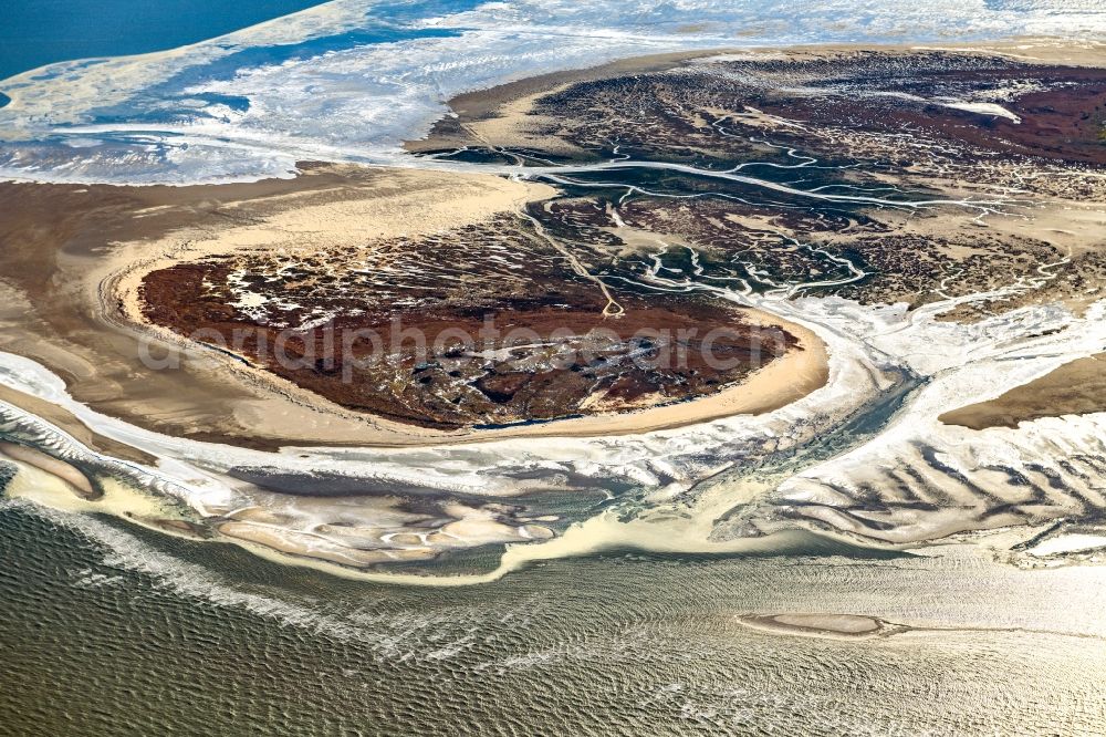 Aerial image Scharhörn - Wintry snowy coastal area of a??a??the North Sea island in Scharhoern Nigehoern outer reef sand banks in the state of Hamburg