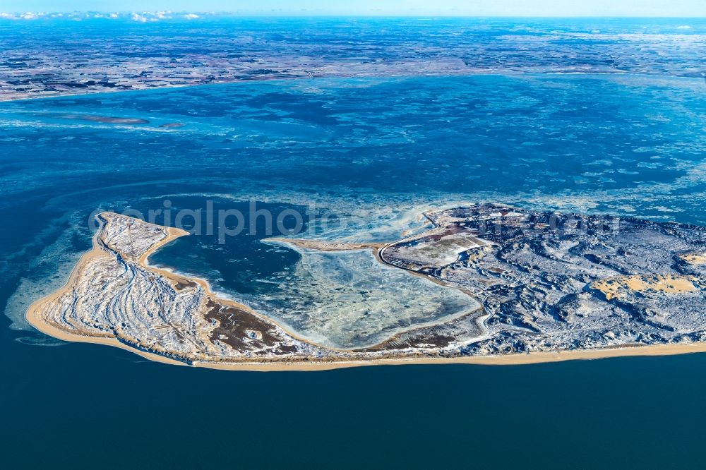 Aerial image List - Wintry snowy coastal area of the North Sea - Island Sylt city List in the state Schleswig-Holstein