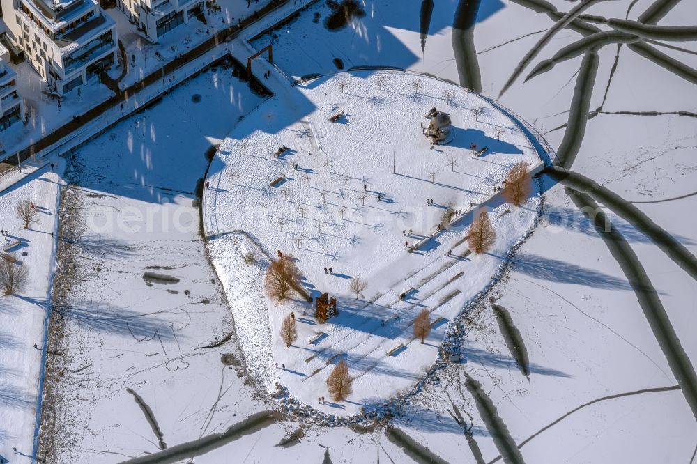 Aerial photograph Dortmund - Wintry snowy lake Island on the Plateau on Phoenix See in the district Hoerde in Dortmund at Ruhrgebiet in the state North Rhine-Westphalia, Germany