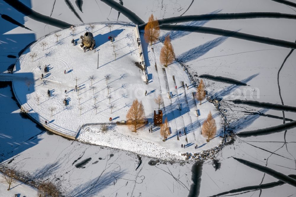 Dortmund from above - Wintry snowy lake Island on the Plateau on Phoenix See in the district Hoerde in Dortmund at Ruhrgebiet in the state North Rhine-Westphalia, Germany