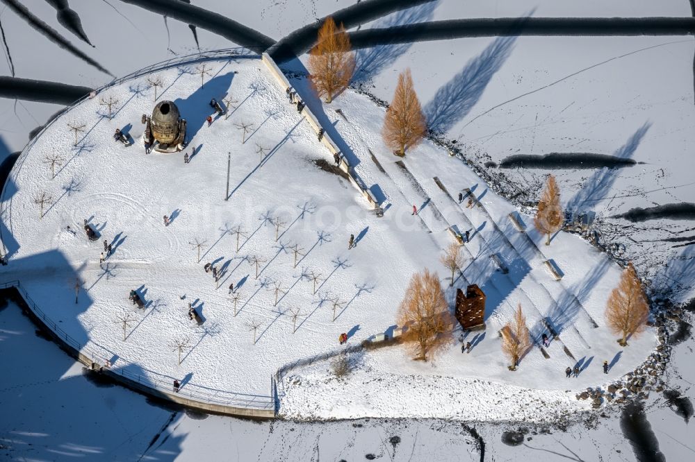 Dortmund from the bird's eye view: Wintry snowy lake Island on the Plateau on Phoenix See in the district Hoerde in Dortmund at Ruhrgebiet in the state North Rhine-Westphalia, Germany