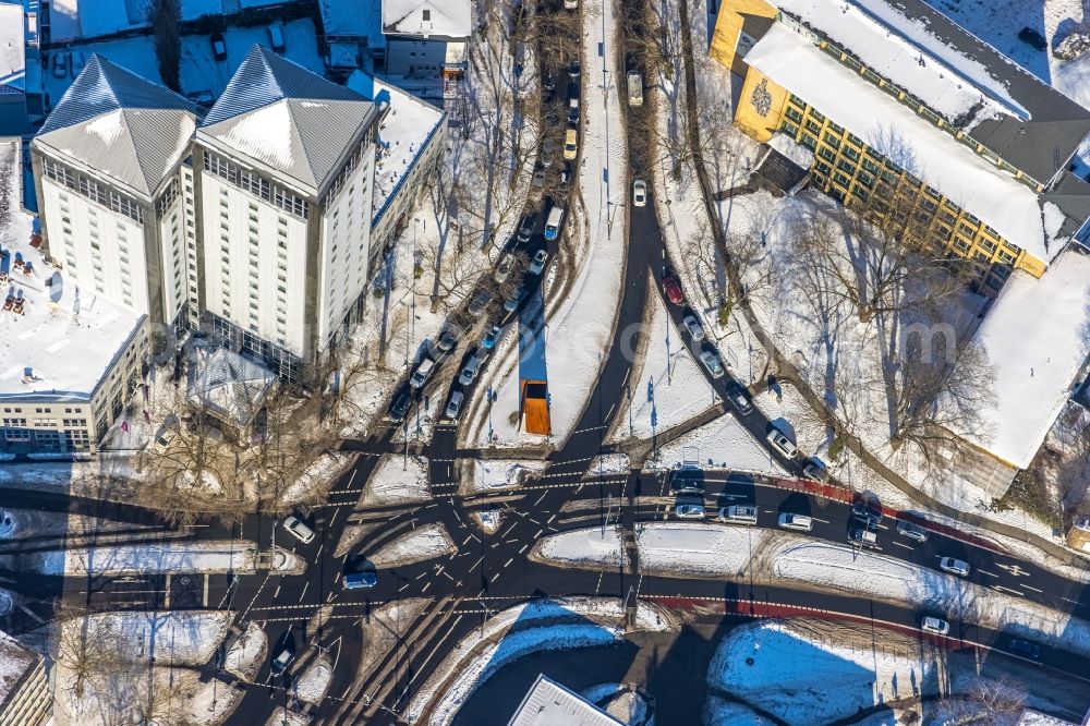 Aerial image Bochum - Wintry snowy road over the crossroads Massenbergstrasse - Kurt-Schumacher-Platz in the district Innenstadt in Bochum in the state North Rhine-Westphalia, Germany