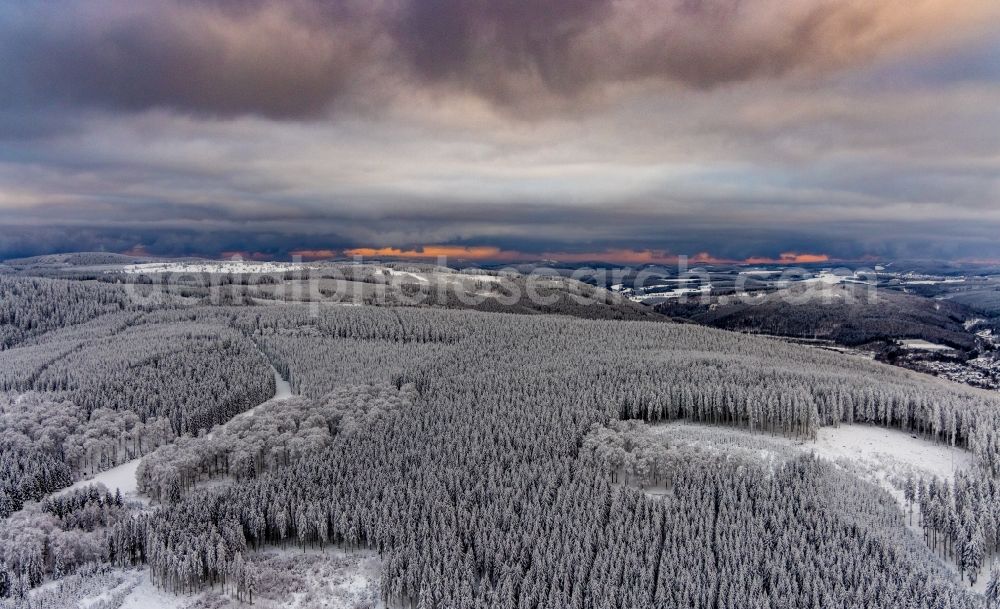 Wiemeringhausen from above - Wintry snowy treetops in a forest area in Wiemeringhausen in the state North Rhine-Westphalia, Germany