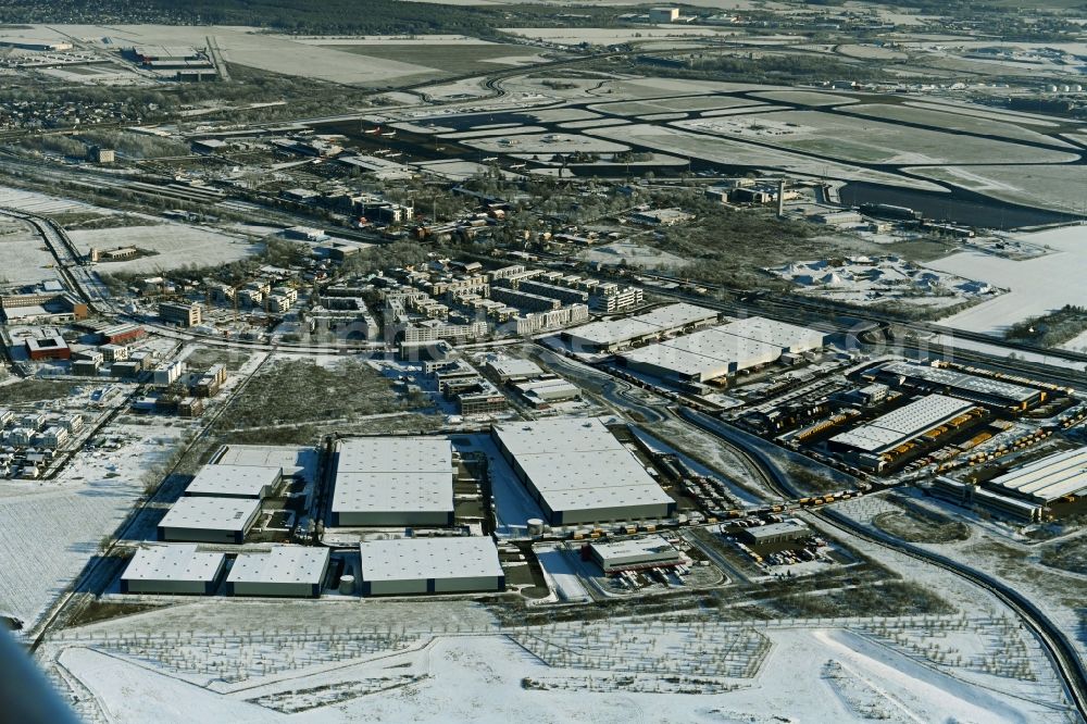 Schönefeld from above - Wintry snowy construction site to build a new building complex on the site of the logistics center of Verdion Airpark Berlin An den Gehren in Schoenefeld in the state Brandenburg, Germany