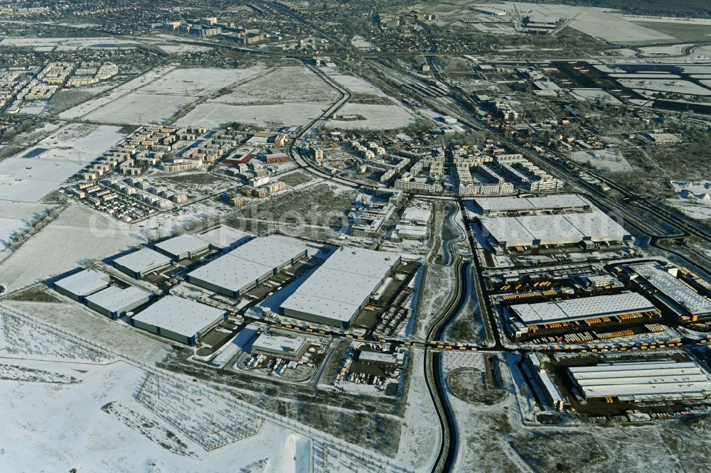 Aerial image Schönefeld - Wintry snowy construction site to build a new building complex on the site of the logistics center of Verdion Airpark Berlin An den Gehren in Schoenefeld in the state Brandenburg, Germany