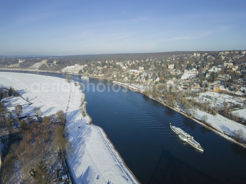 Aerial image Dresden - Wintry snowy loschwitz Bridge Blue Wonder over the river Elbe in Dresden in the federal state of Saxony in winter. The Elbe Bridge, completed in 1893, connects the districts of Blasewitz and Loschwitz and is considered a landmark of the city