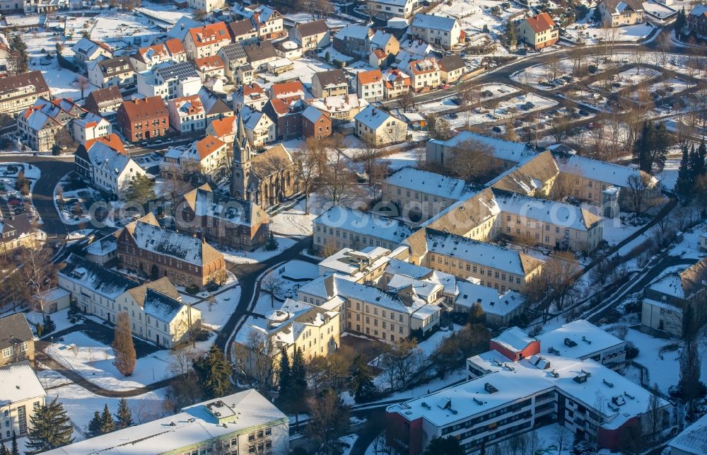 Marsberg from the bird's eye view: Wintry snowy view of the LWL living facility in Marsberg in the state of North Rhine-Westphalia