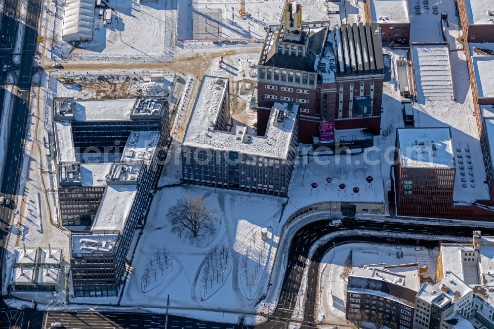 Dortmund from the bird's eye view: Wintry snowy museum and exhibition building ensemble Dortmund U Center for Art and Creativity on Emil-Schumacher-Strasse in the district of Westpark in Dortmund in the Ruhr area in the state North Rhine-Westphalia, Germany