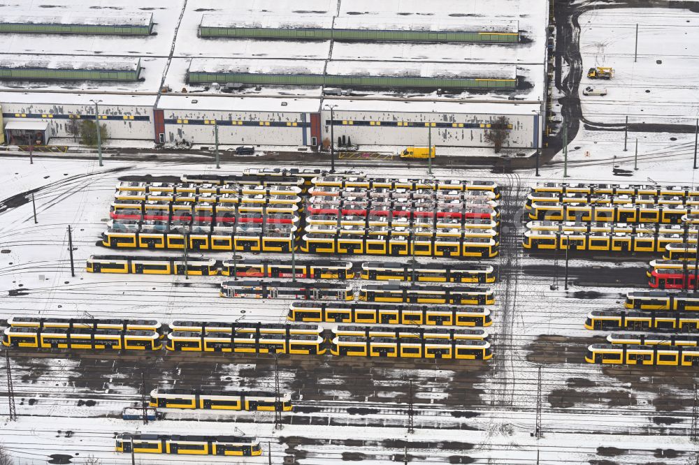 Aerial image Berlin - Wintry snowy tram depot of the Municipal Transport Company BVG Betriebshon street Landsberger Allee of Marzahn on street Landsberger Allee in the district Marzahn in Berlin, Germany