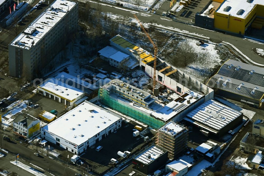 Aerial photograph Berlin - Wintry snowy new building construction site in the industrial park on Berliner Allee in the district Weissensee in Berlin, Germany