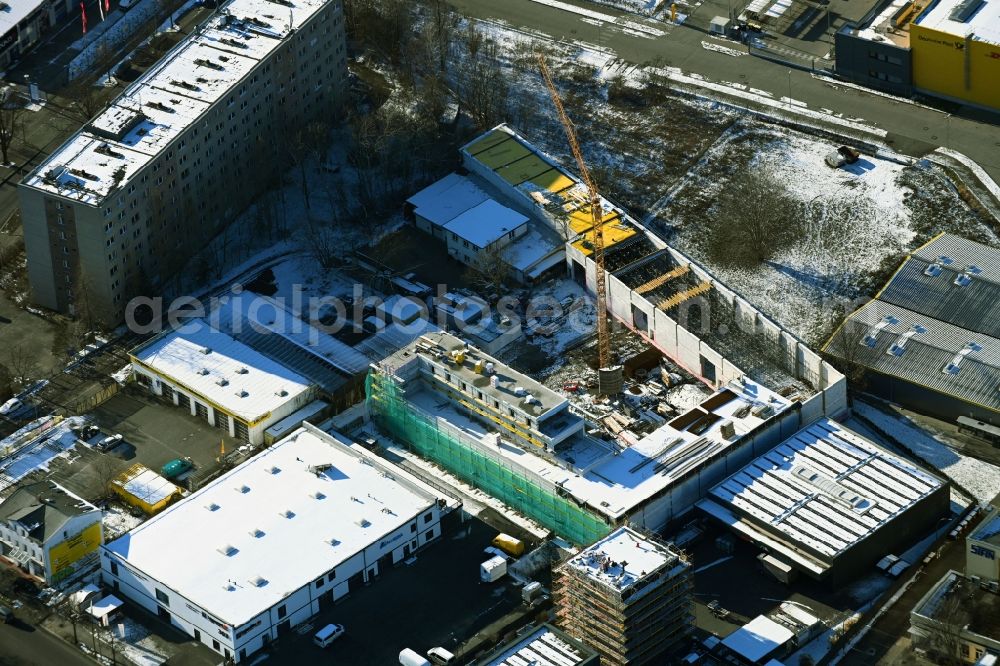 Berlin from above - Wintry snowy new building construction site in the industrial park on Berliner Allee in the district Weissensee in Berlin, Germany