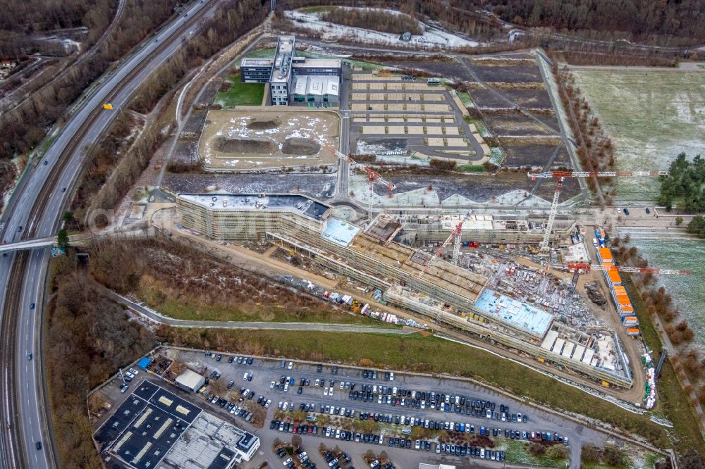 Dortmund from above - Wintry snowy new construction of the company administration building of Materna Information & Communications SE on street Robert-Schuman-Strasse in the district Phoenix West in Dortmund at Ruhrgebiet in the state North Rhine-Westphalia, Germany