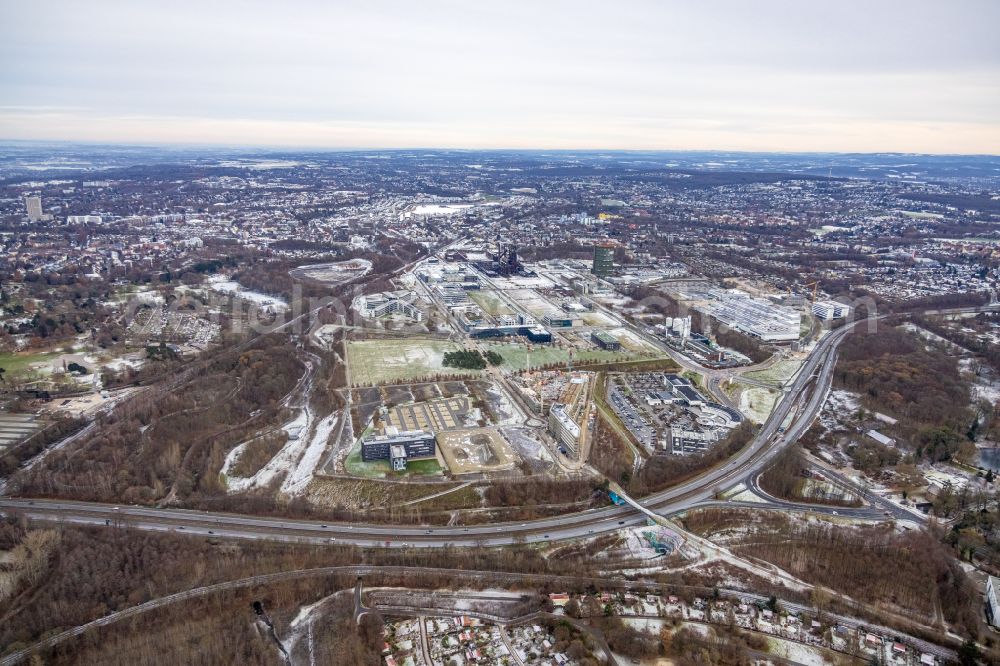 Aerial photograph Dortmund - Wintry snowy new construction of the company administration building of Materna Information & Communications SE on street Robert-Schuman-Strasse in the district Phoenix West in Dortmund at Ruhrgebiet in the state North Rhine-Westphalia, Germany